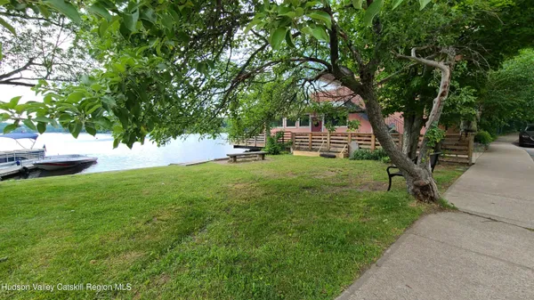 a view of a deck with a backyard
