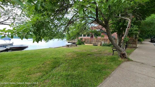 a view of a deck with a backyard