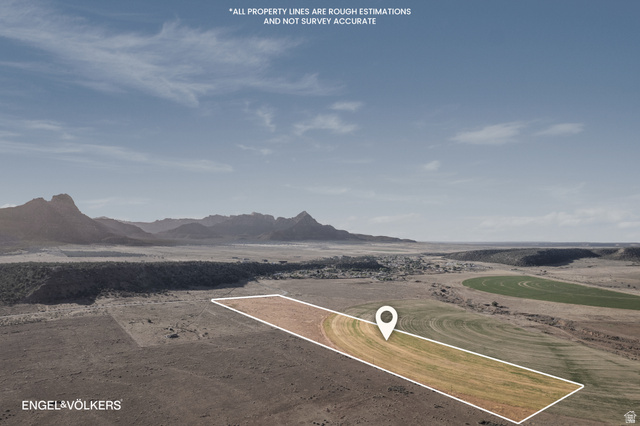 Gooseberry Way Apple Valley, UT 84737 - Photo 3 of 24 Expansive land parcel featuring defined property lines and surrounding agricultural fields