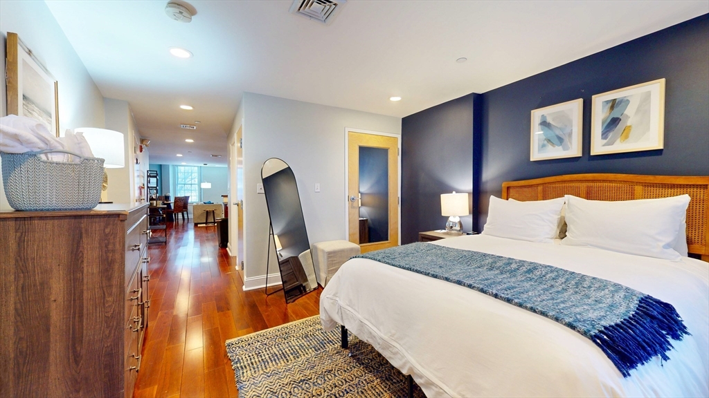 15-2 Union Street, Unit FURNISHED Boston, MA 02108 - Photo 9 of 9 a spacious bedroom with a bed and a view of living room