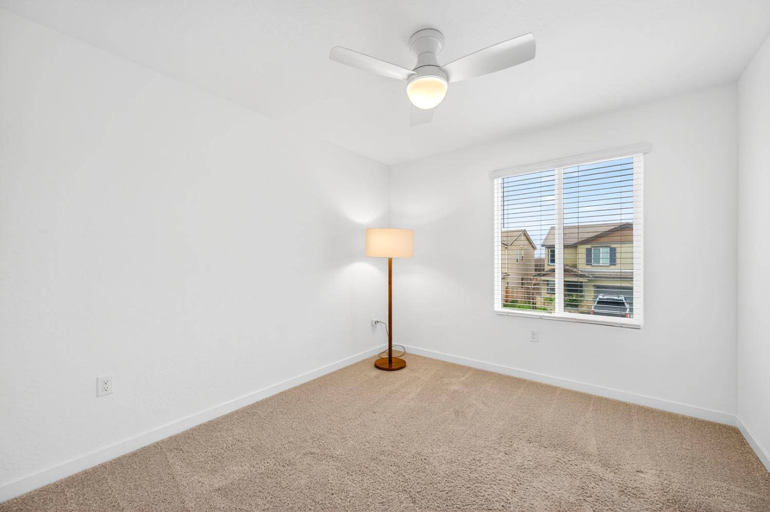 317 Talus Way South Madera, CA 93636 - Photo 39 of 61 an empty room with windows