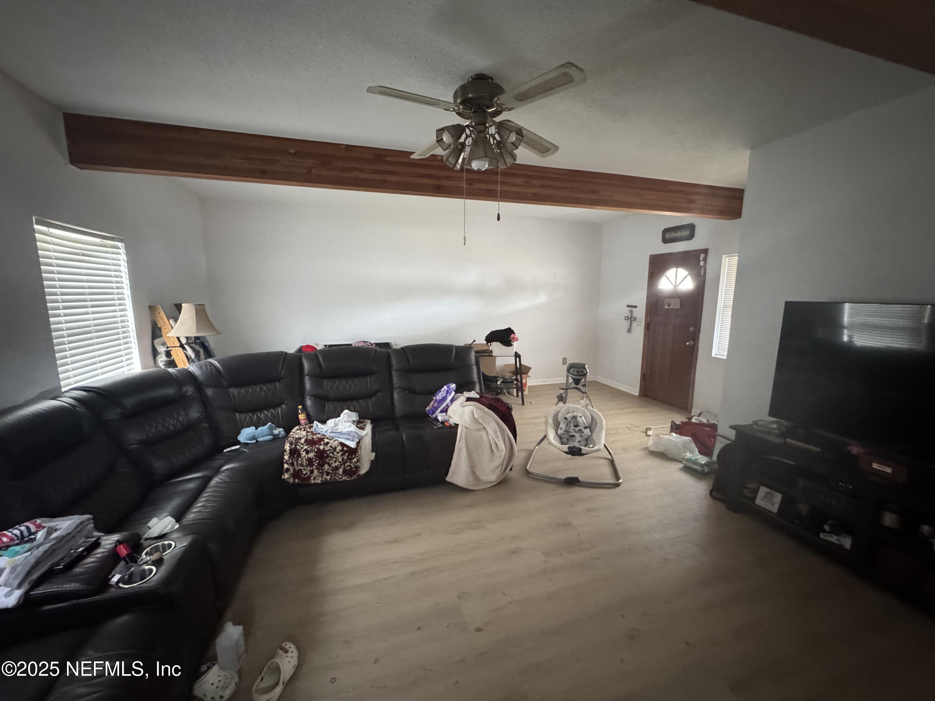 5515-5517 Shad Road Jacksonville, FL 32257 - Photo 10 of 17 a living room with furniture