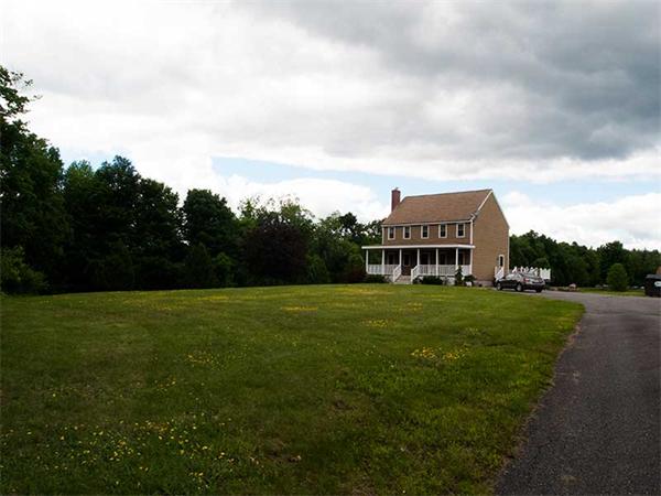 401 Mulpus Road Lunenburg, MA 01462 - Photo 15 of 15 a view of a big house with a big yard and large trees