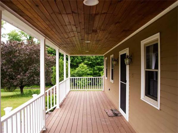 401 Mulpus Road Lunenburg, MA 01462 - Photo 2 of 15 a porch with seating space