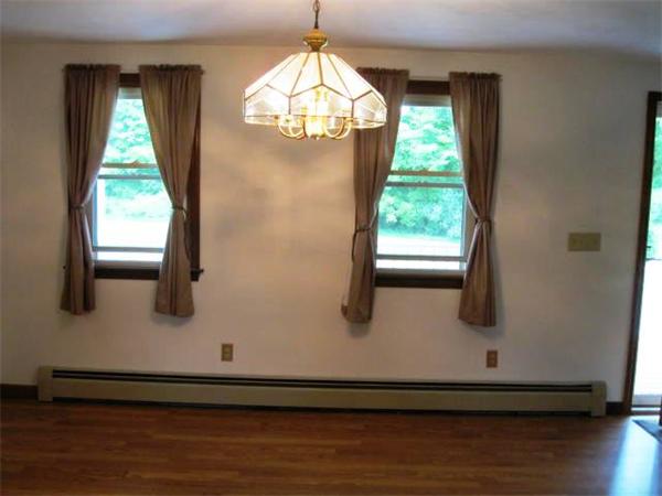 401 Mulpus Road Lunenburg, MA 01462 - Photo 4 of 15 a view of a living room with a window