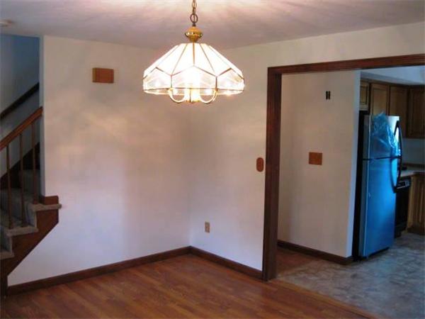 401 Mulpus Road Lunenburg, MA 01462 - Photo 5 of 15 a view of a livingroom with wooden floor