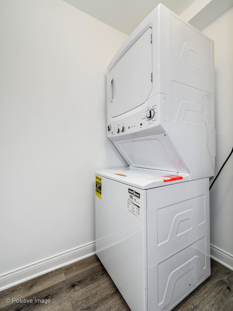 2919 North Kilpatrick Avenue, Unit 2 Chicago, IL 60641 - Photo 15 of 17 a utility room with dryer and washer