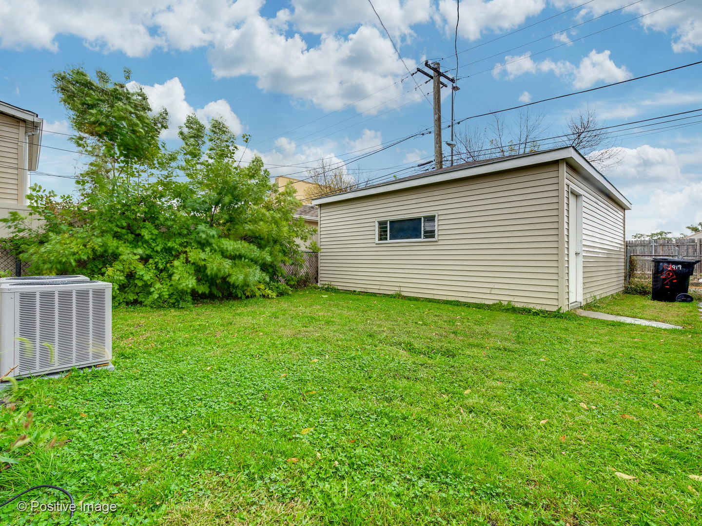 2919 North Kilpatrick Avenue, Unit 2 Chicago, IL 60641 - Photo 16 of 17 a view of a backyard with potted plants