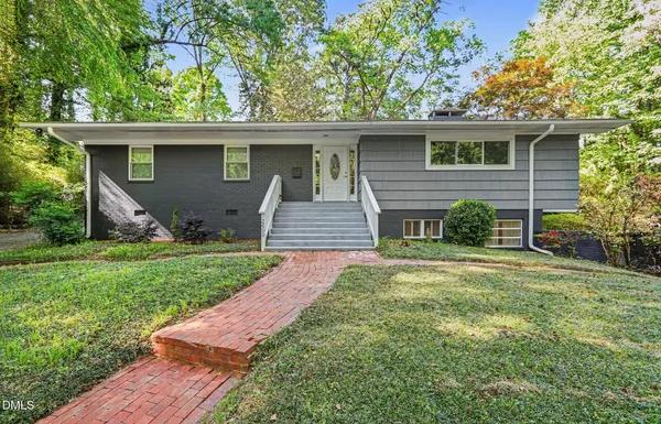 front view of a house with a yard