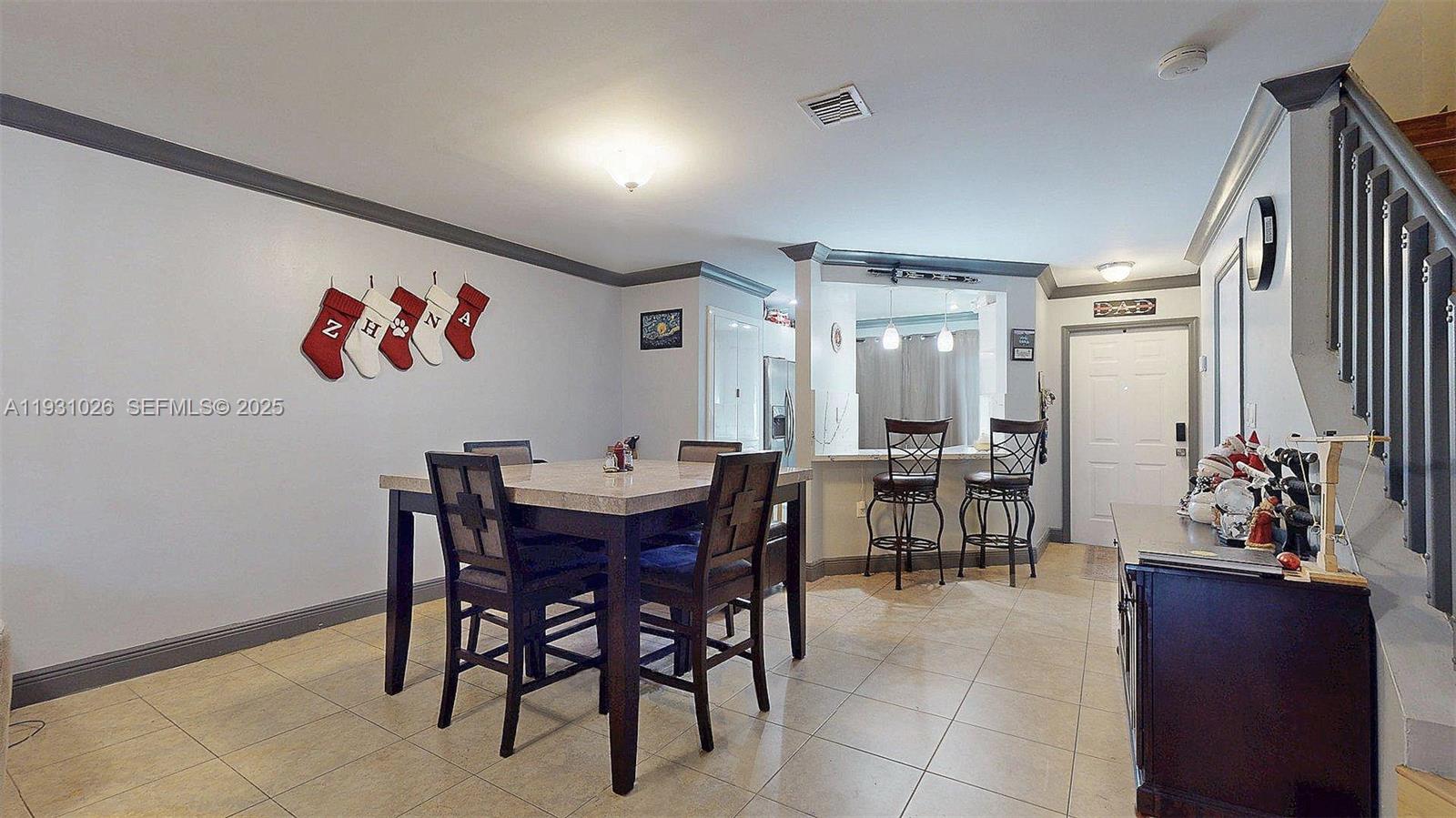 6279 Southwest 128th Court Miami, FL 33183 - Photo 11 of 32 a view of a dining room with furniture