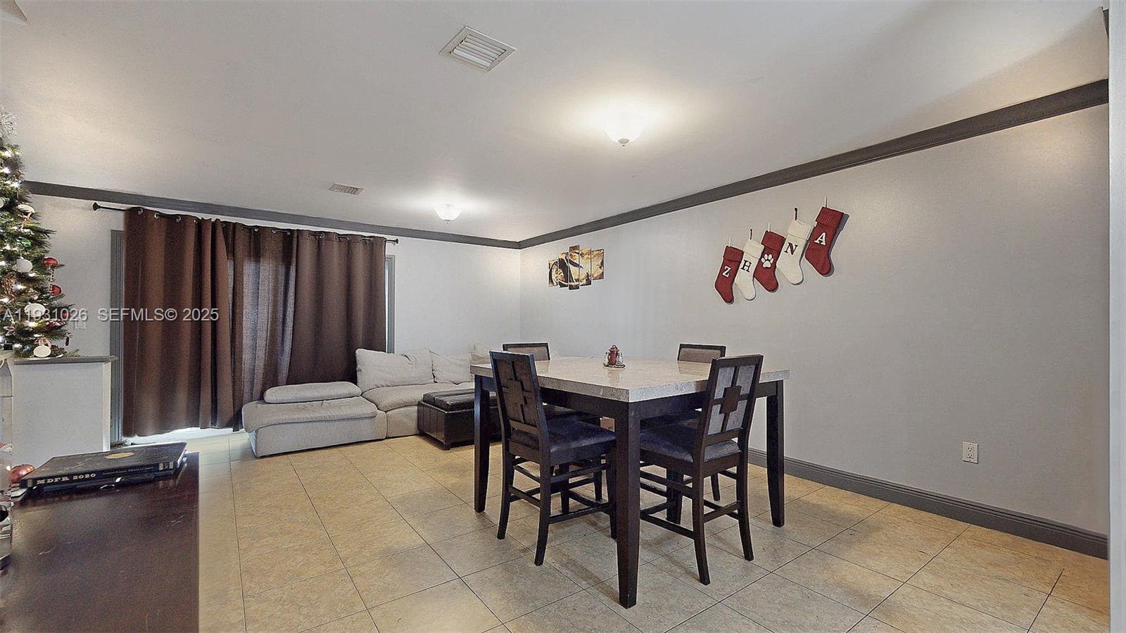 6279 Southwest 128th Court Miami, FL 33183 - Photo 15 of 32 a view of a dining room with furniture