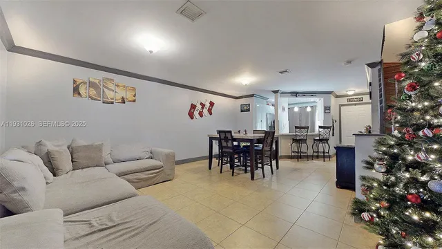 a bedroom with bunk bed and a window