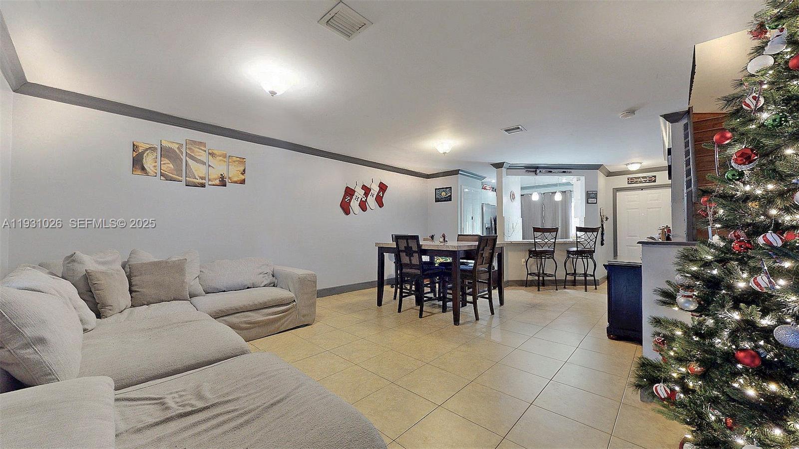 6279 Southwest 128th Court Miami, FL 33183 - Photo 17 of 32 a living room with furniture and a potted plant