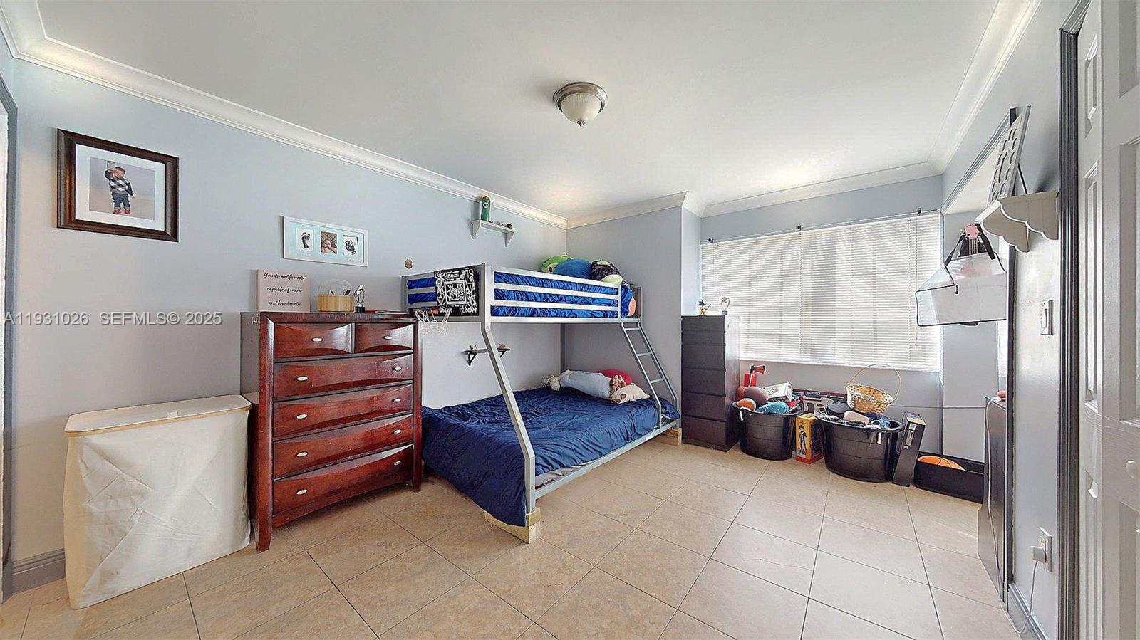 6279 Southwest 128th Court Miami, FL 33183 - Photo 19 of 32 a bedroom with furniture and a cabinet