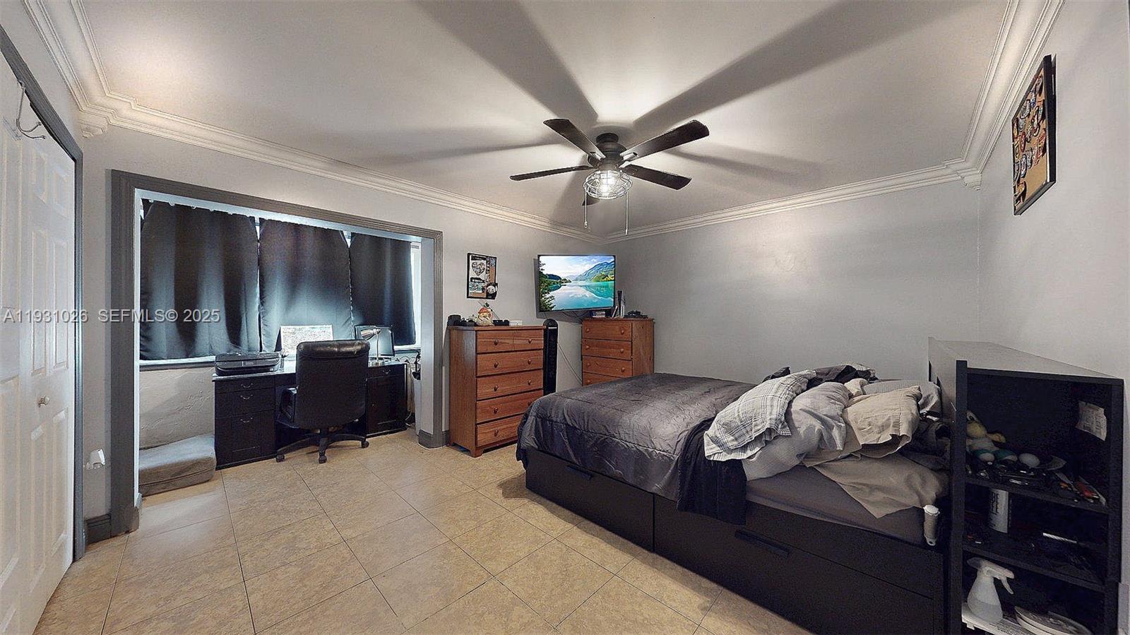 6279 Southwest 128th Court Miami, FL 33183 - Photo 24 of 32 a bedroom with a bed and furniture