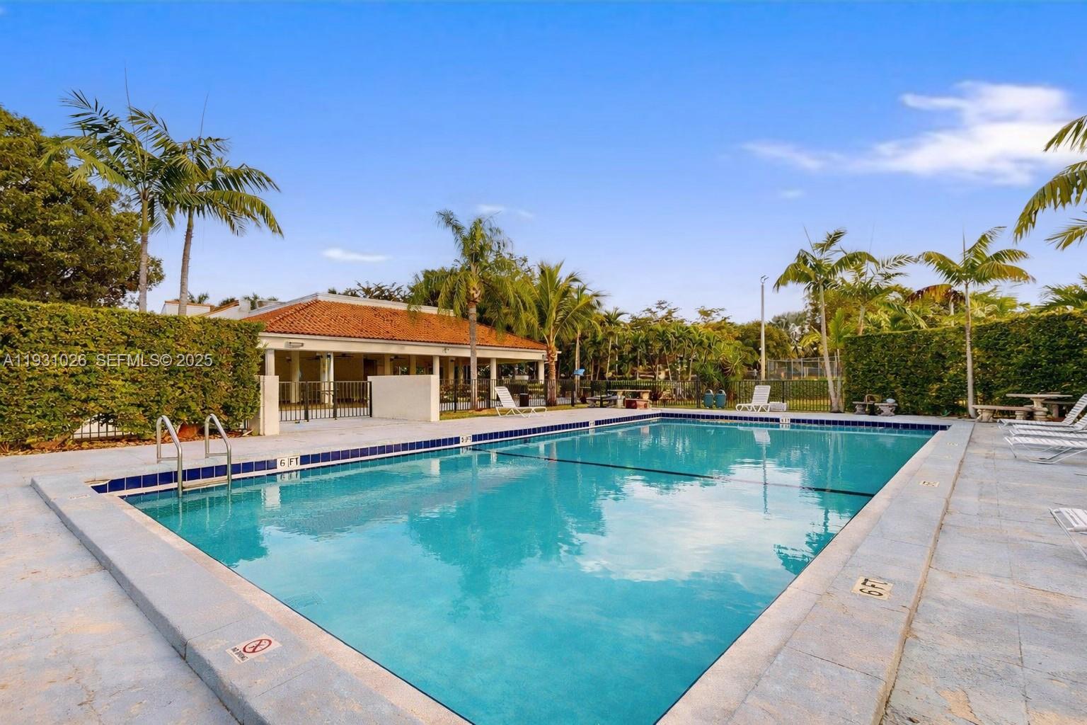 6279 Southwest 128th Court Miami, FL 33183 - Photo 30 of 32 a view of a swimming pool with a patio