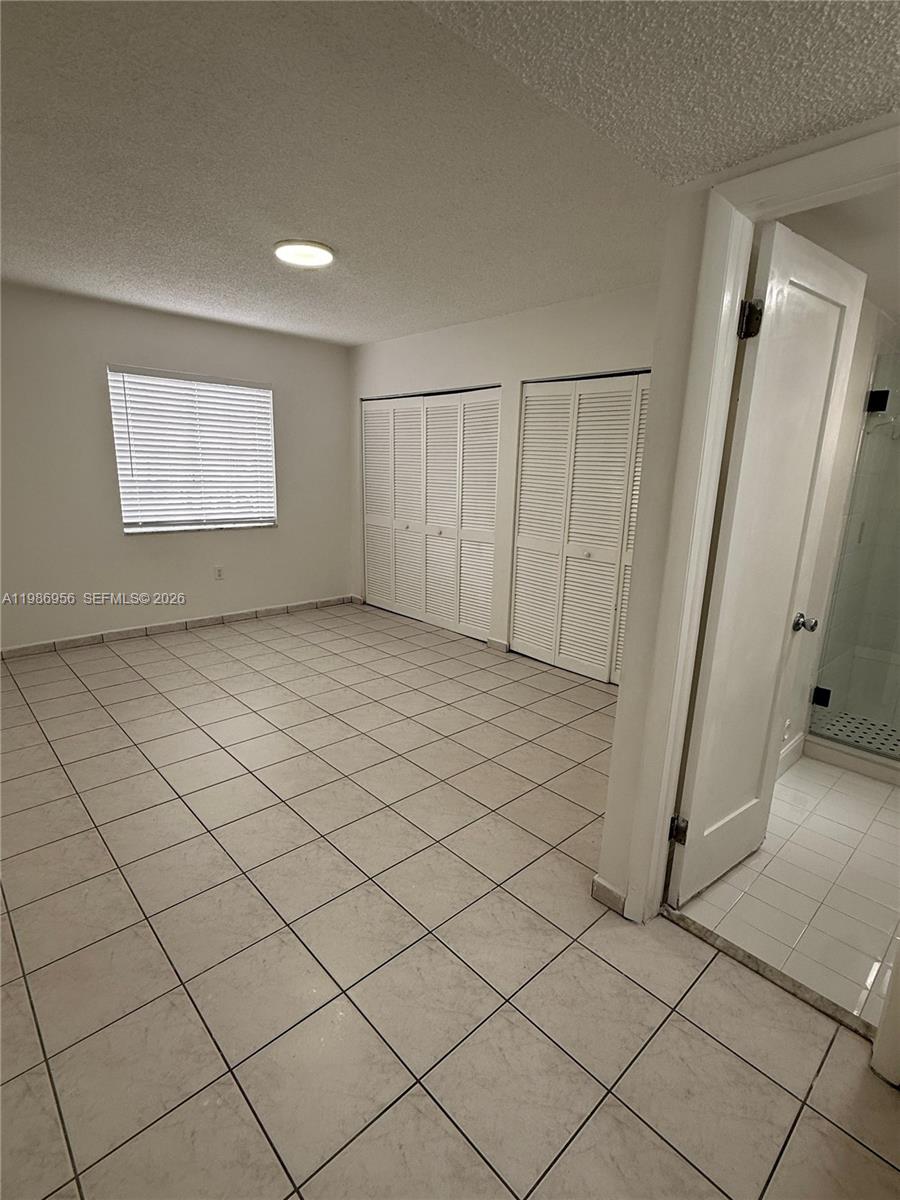 3262 West 70th Street, Unit 101 Hialeah, FL 33018 - Photo 11 of 17 Master Bedroom