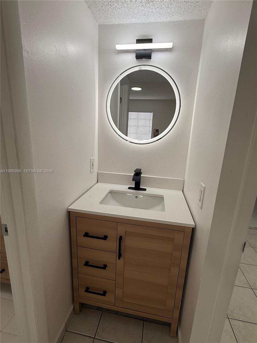 3262 West 70th Street, Unit 101 Hialeah, FL 33018 - Photo 12 of 17 Second Vanity at Master Bedroom
