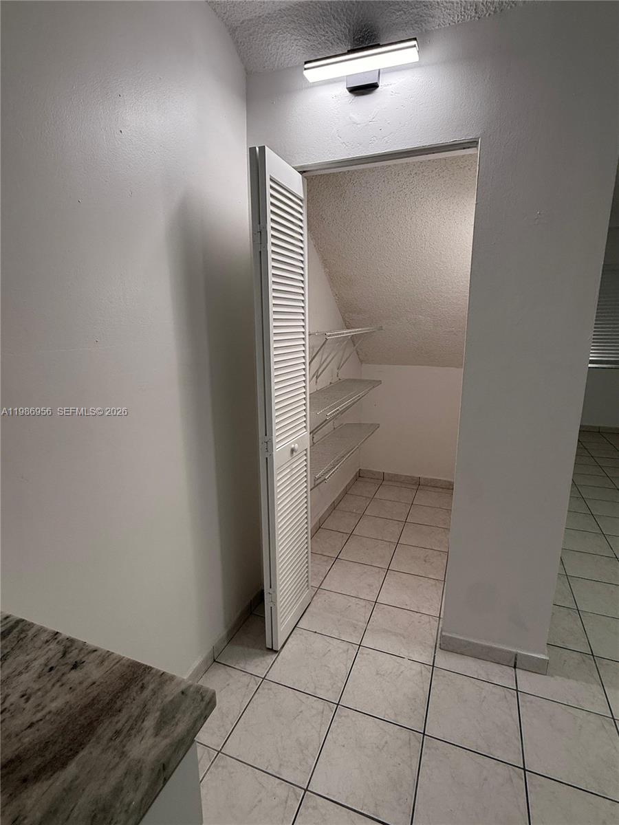3262 West 70th Street, Unit 101 Hialeah, FL 33018 - Photo 8 of 17 Kitchen Pantry