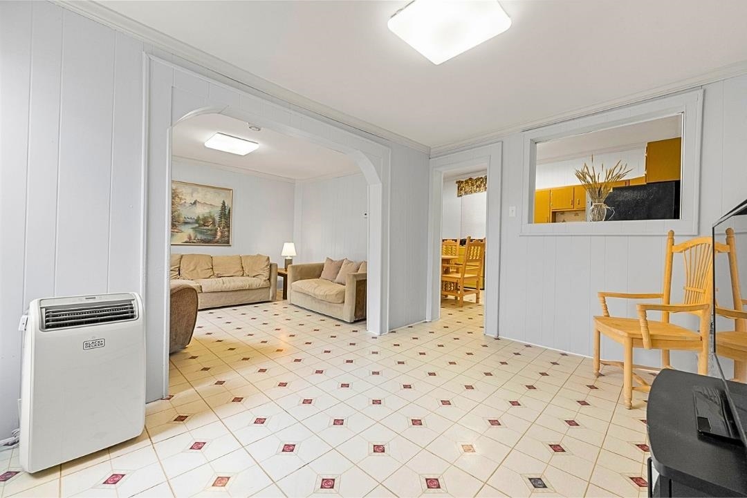 520 27th Street Union City, NJ 07087 - Photo 5 of 19 a bedroom with a bed and furniture