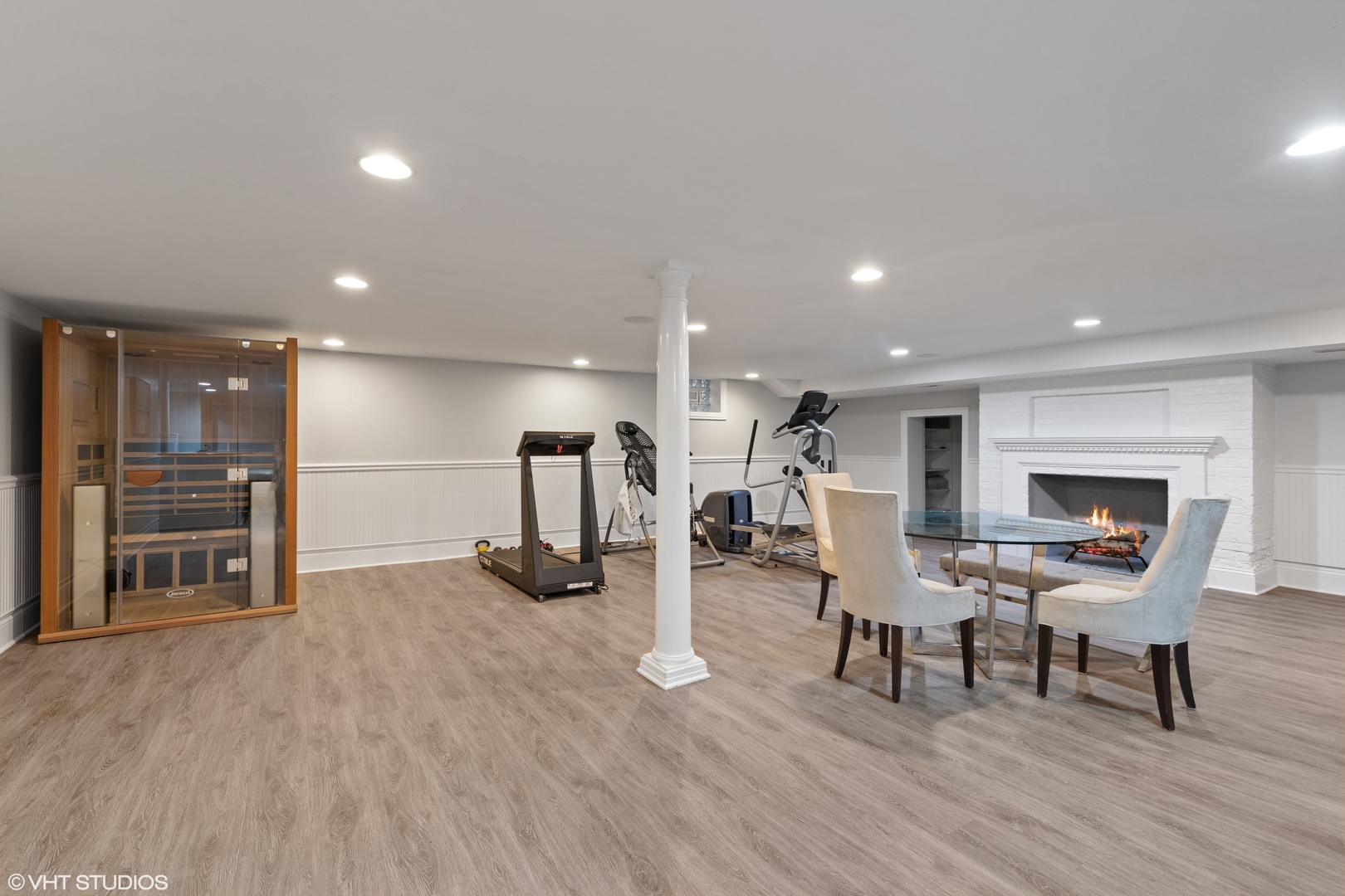 228 Raleigh Road Kenilworth, IL 60043 - Photo 50 of 57 a view of a kitchen with dining room and wooden floor