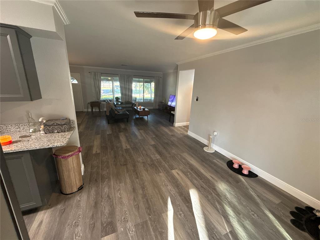 903 North Harbor Terrace Road Tavares, FL 32778 - Photo 32 of 69 a view of a room with wooden floor and window