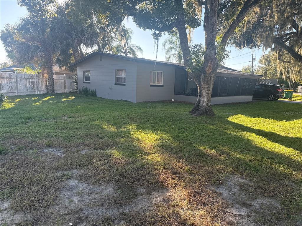 903 North Harbor Terrace Road Tavares, FL 32778 - Photo 66 of 69 a view of a house with a yard