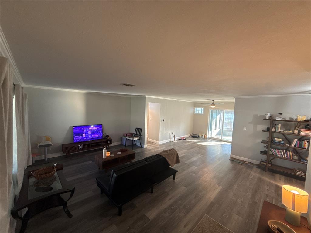 903 North Harbor Terrace Road Tavares, FL 32778 - Photo 9 of 69 a living room with furniture and a wooden floor