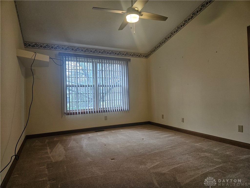 4909 Shannon Avenue Springfield, OH 45504 - Photo 12 of 21 This airy room features a sloped ceiling and abundant natural light.