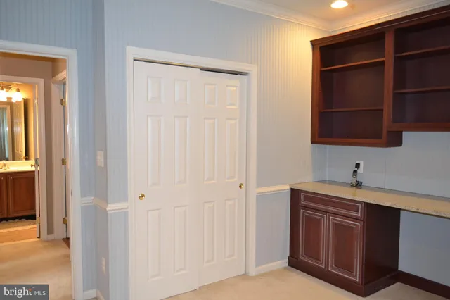 a kitchen with a sink and a microwave