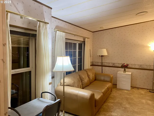 a room with a table and chairs