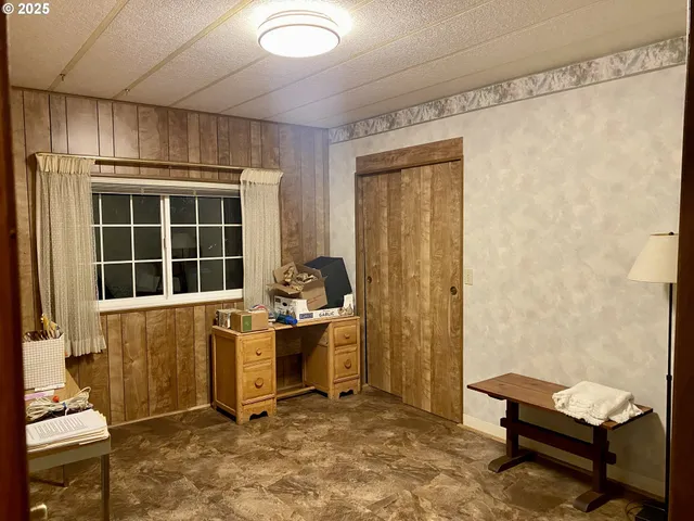 a view of a bathroom with a shower and a sink