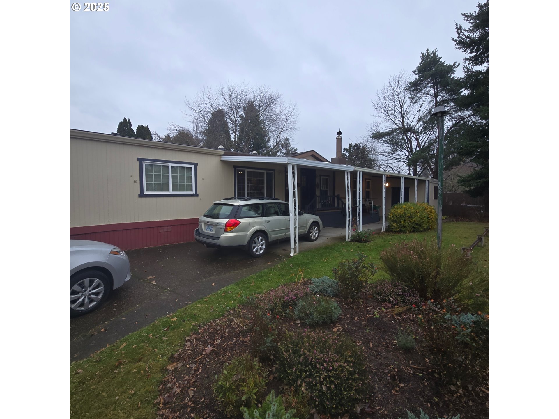 7858 Southeast King Road, Unit 7 Milwaukie, OR 97222 - Photo 3 of 31 a view of a house with backyard and a tree