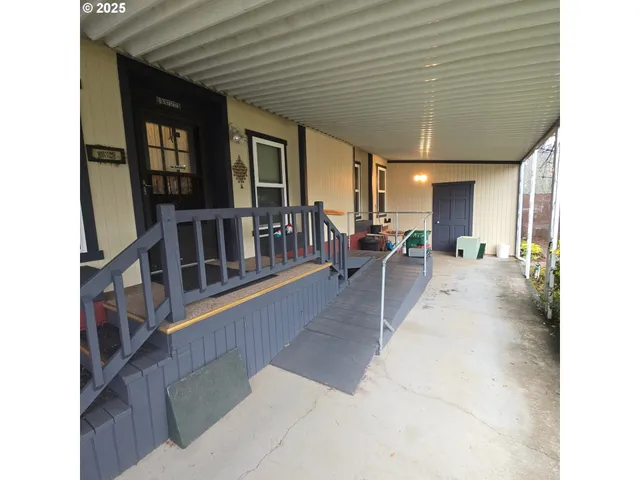 a view of kitchen with windows