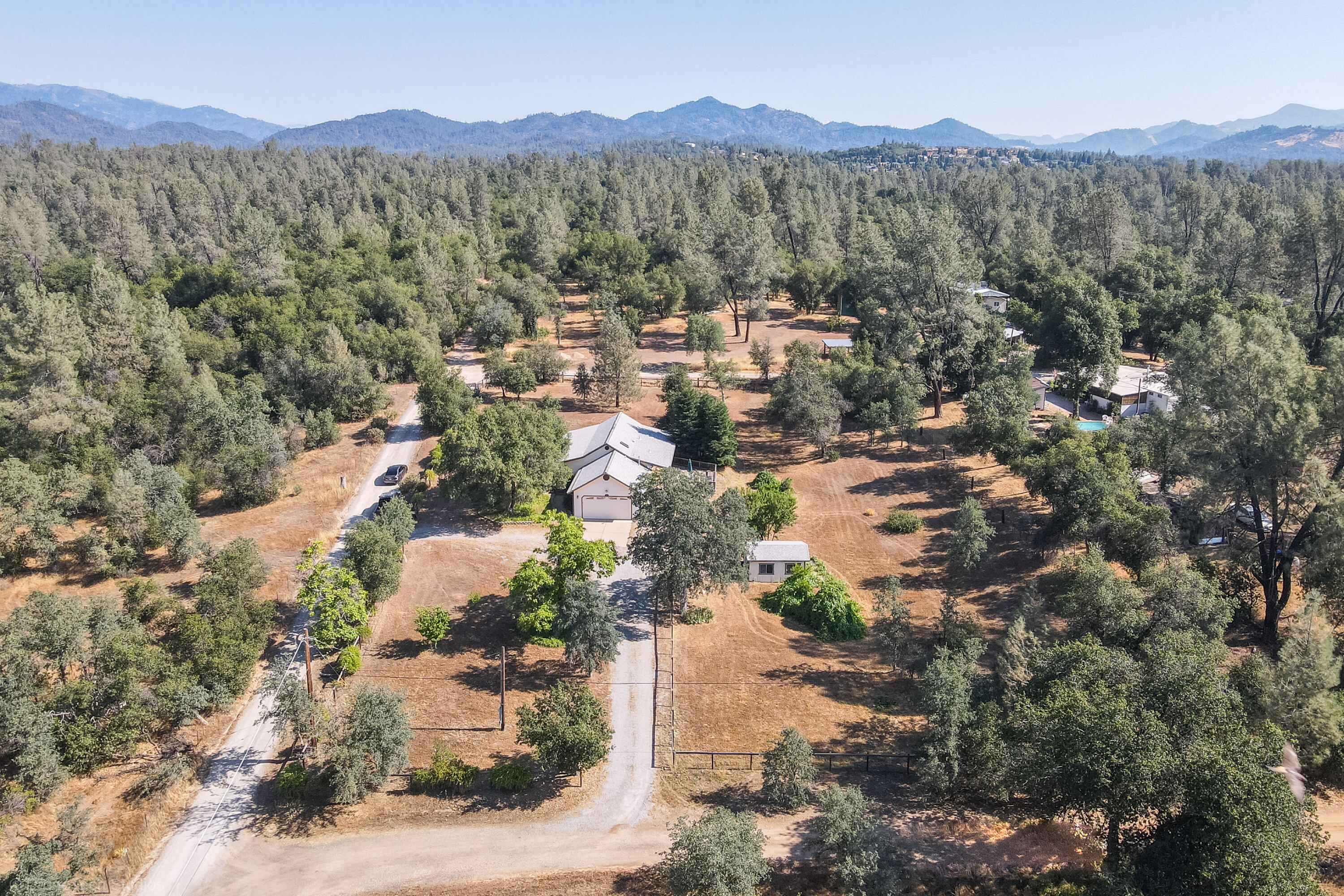 12265 Randolph Road Redding, CA 96003 - Photo 33 of 35 a view of a town with mountains in the background
