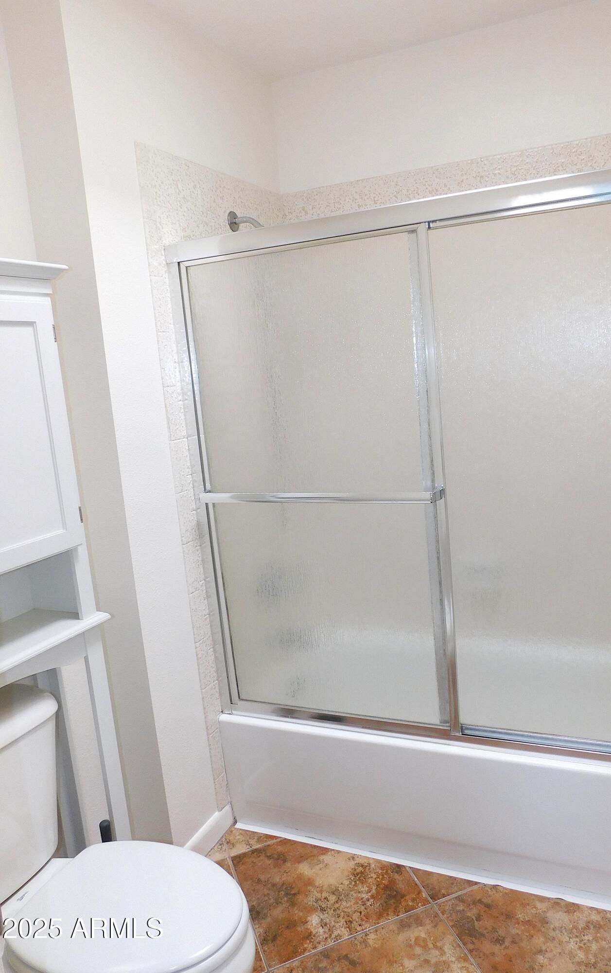 520 South Evergreen Road Tempe, AZ 85288 - Photo 20 of 24 a bathroom with a shower and a toilet