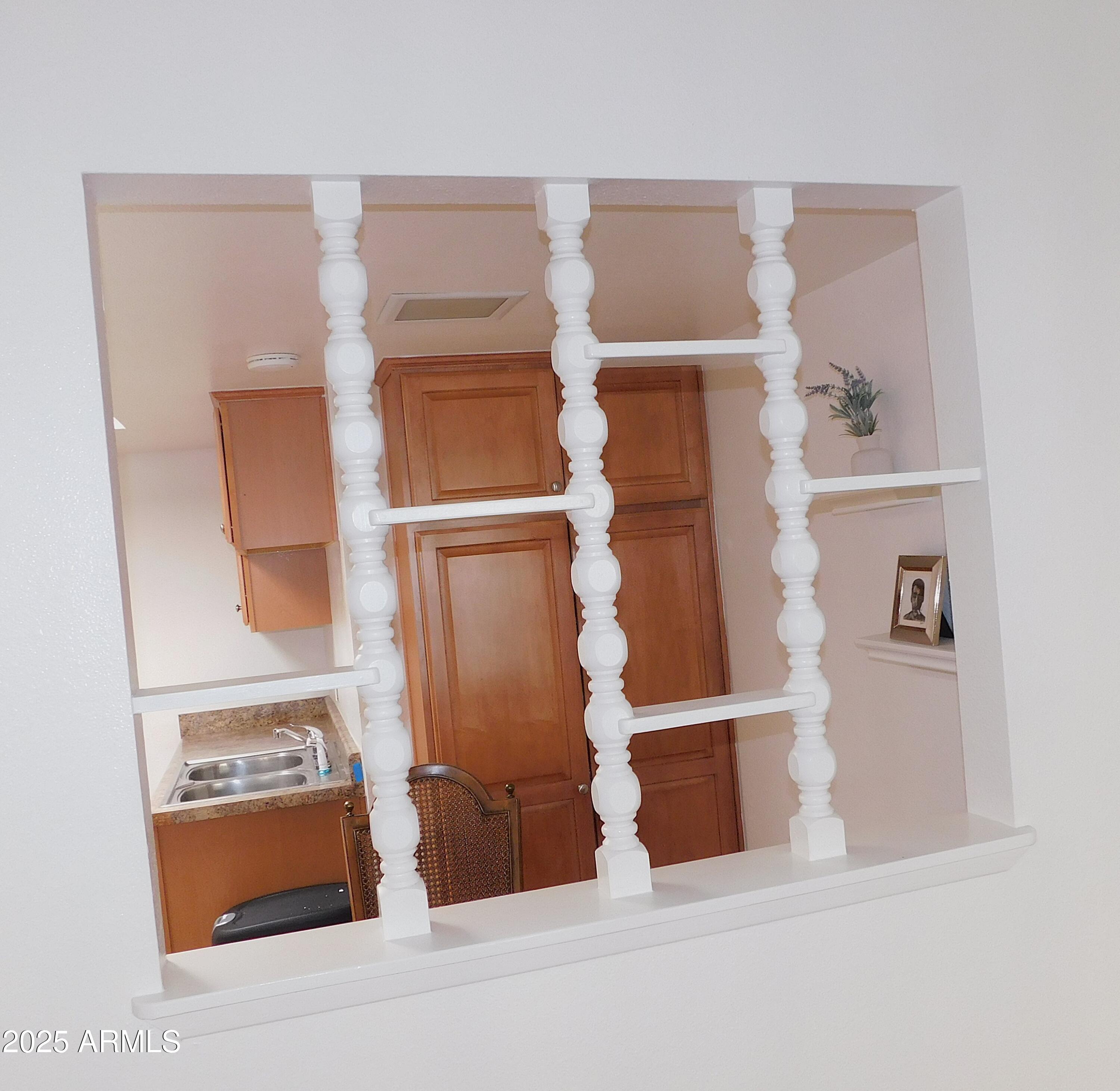 520 South Evergreen Road Tempe, AZ 85288 - Photo 10 of 24 a view of walk in closet with clothes and shoes
