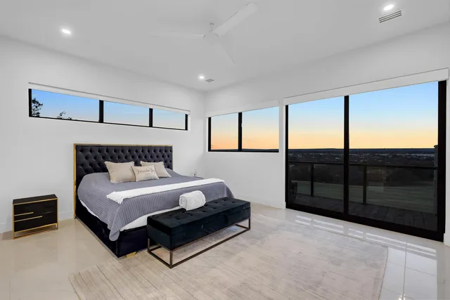 a bedroom with a bed and dresser