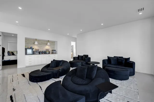 a living room with furniture and a couch