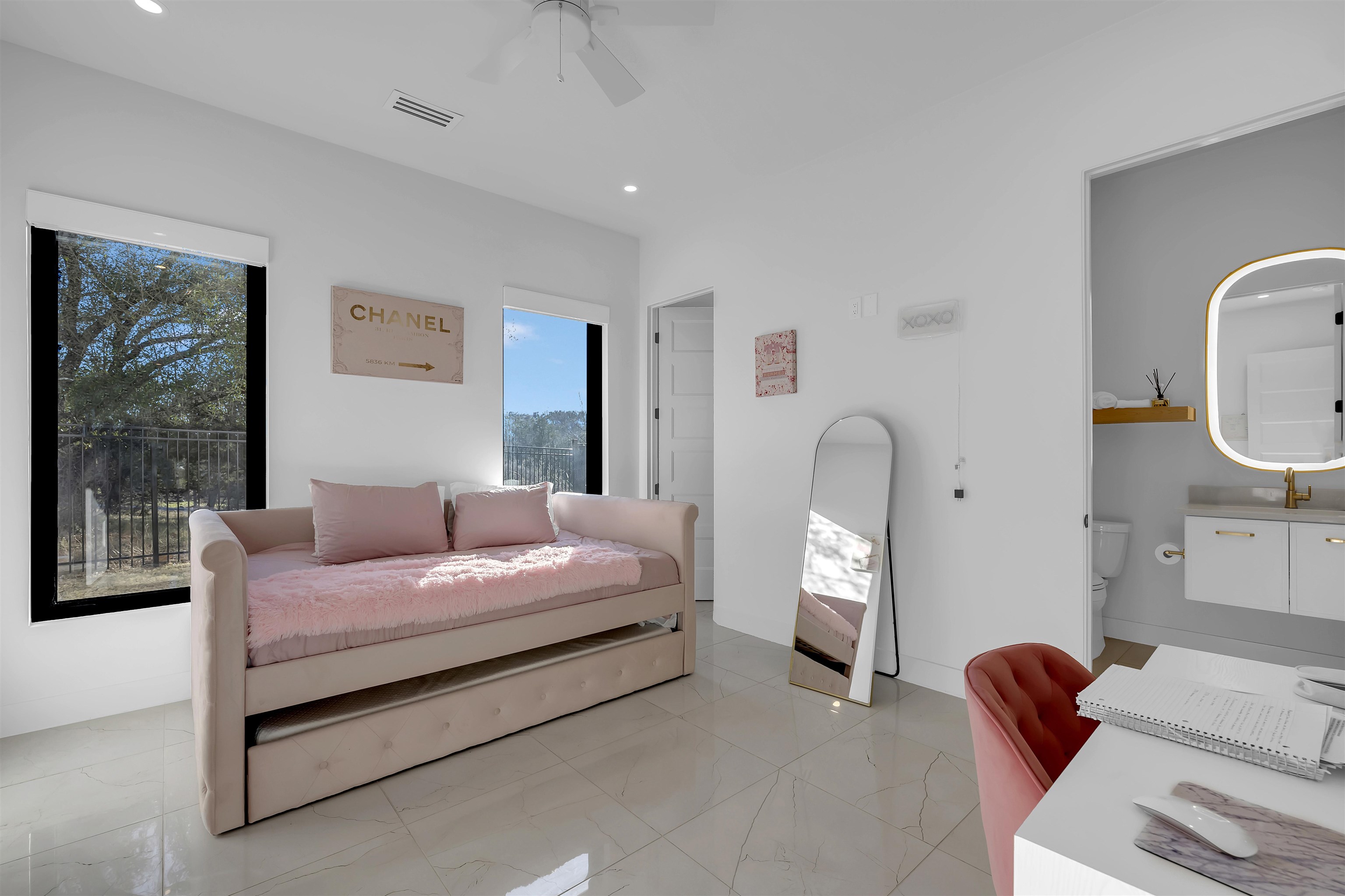 207 Kites Court Horseshoe Bay, TX 78657 - Photo 26 of 30 a bedroom with a bed and a mirror