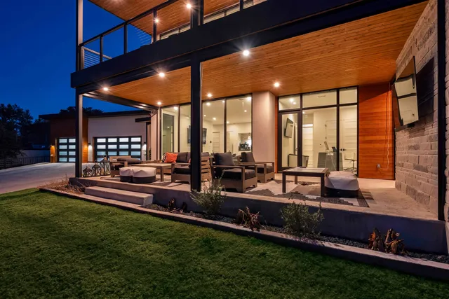 a building outdoor space with patio furniture and outdoor seating