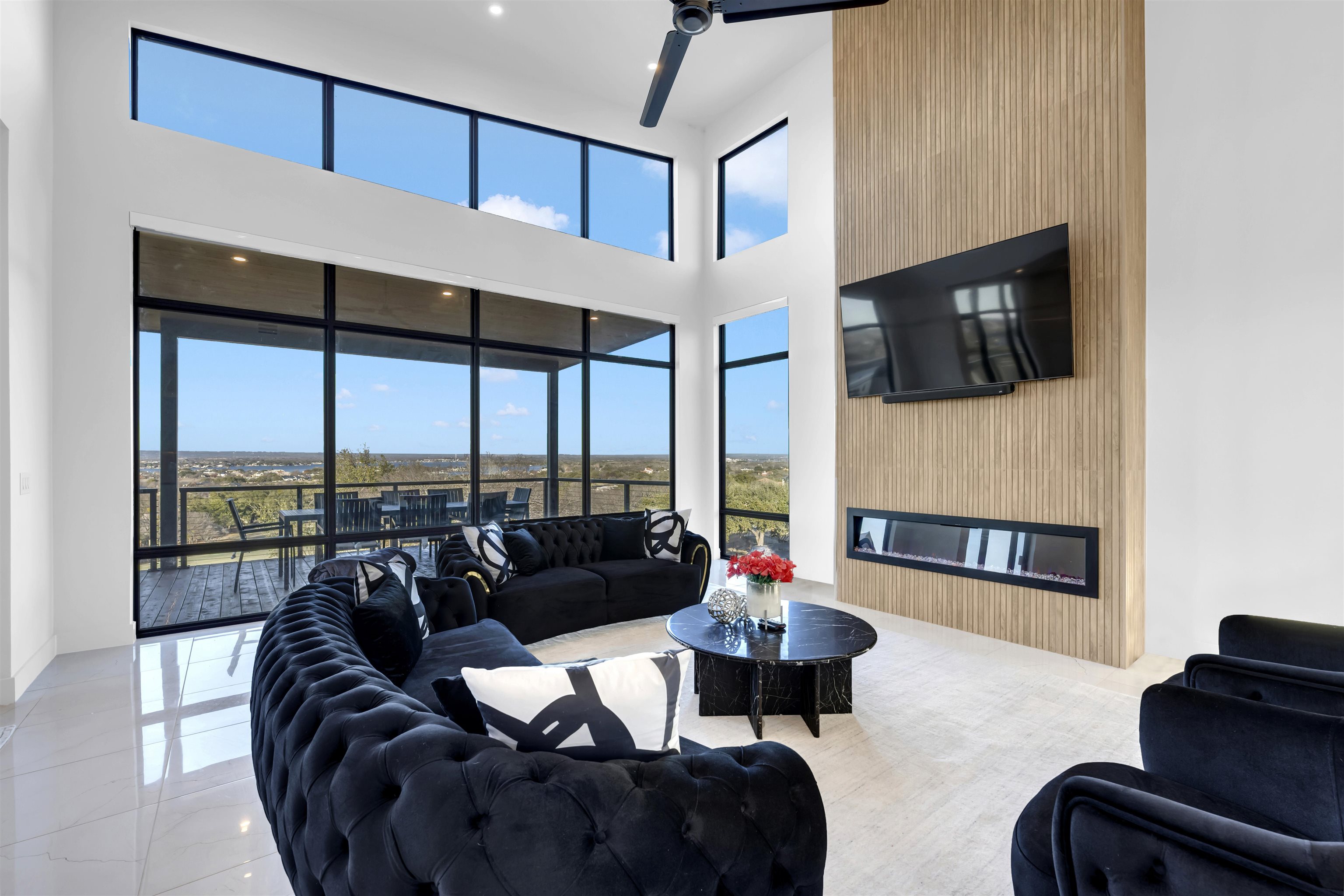 207 Kites Court Horseshoe Bay, TX 78657 - Photo 6 of 30 a living room with furniture and a flat screen tv