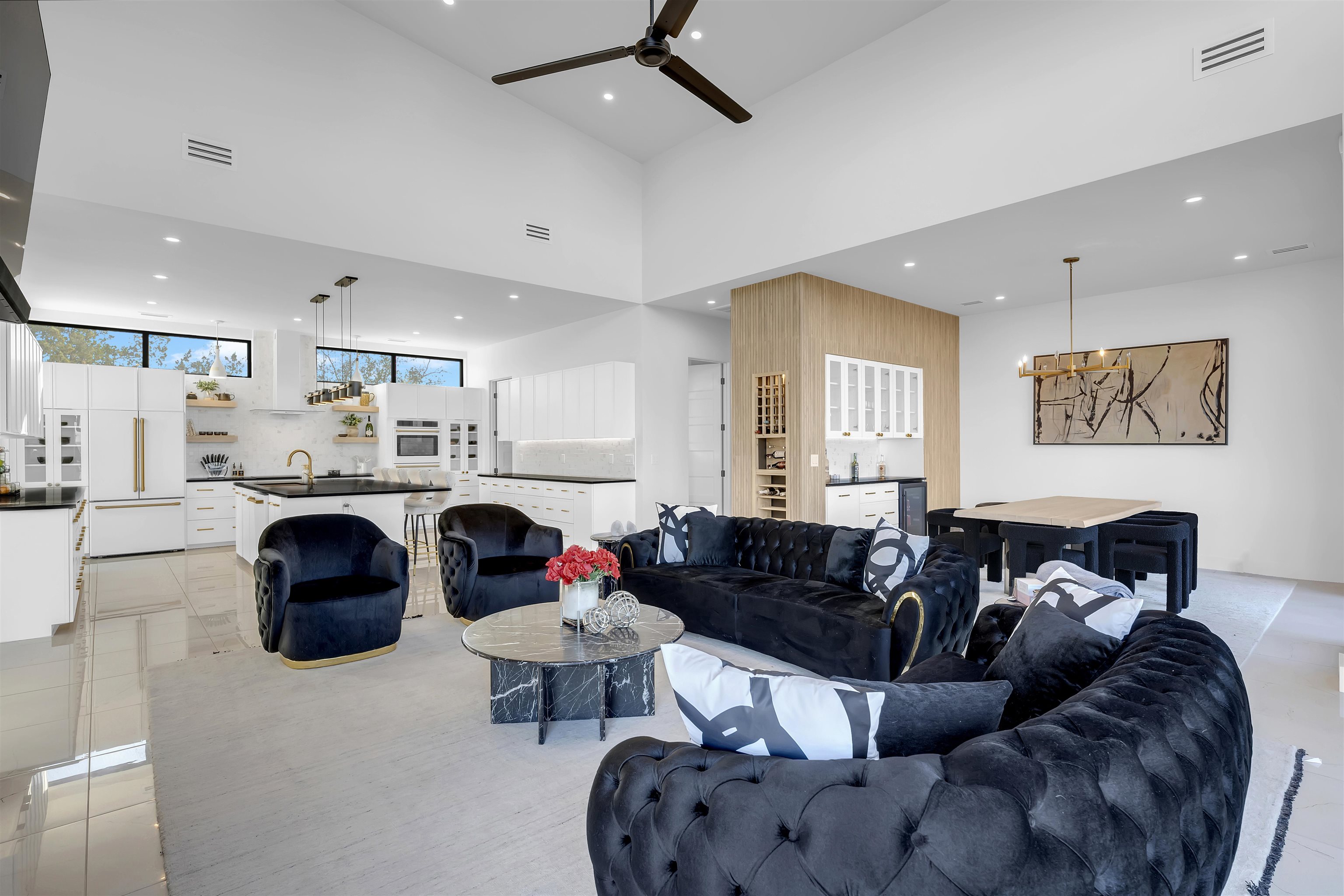 207 Kites Court Horseshoe Bay, TX 78657 - Photo 7 of 30 a living room with furniture and a chandelier