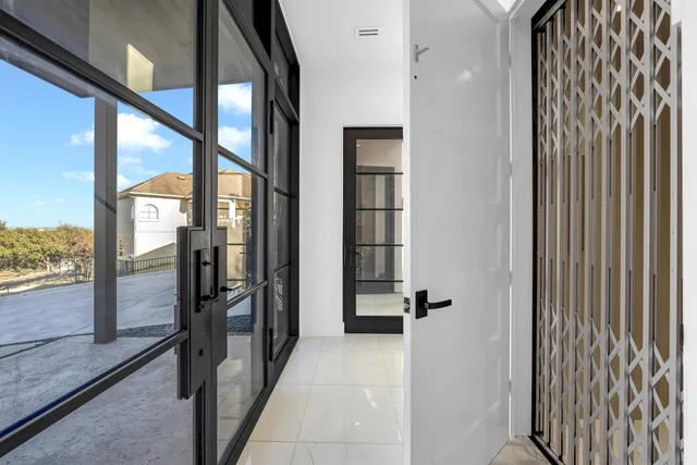 a view of a bathroom with a glass door
