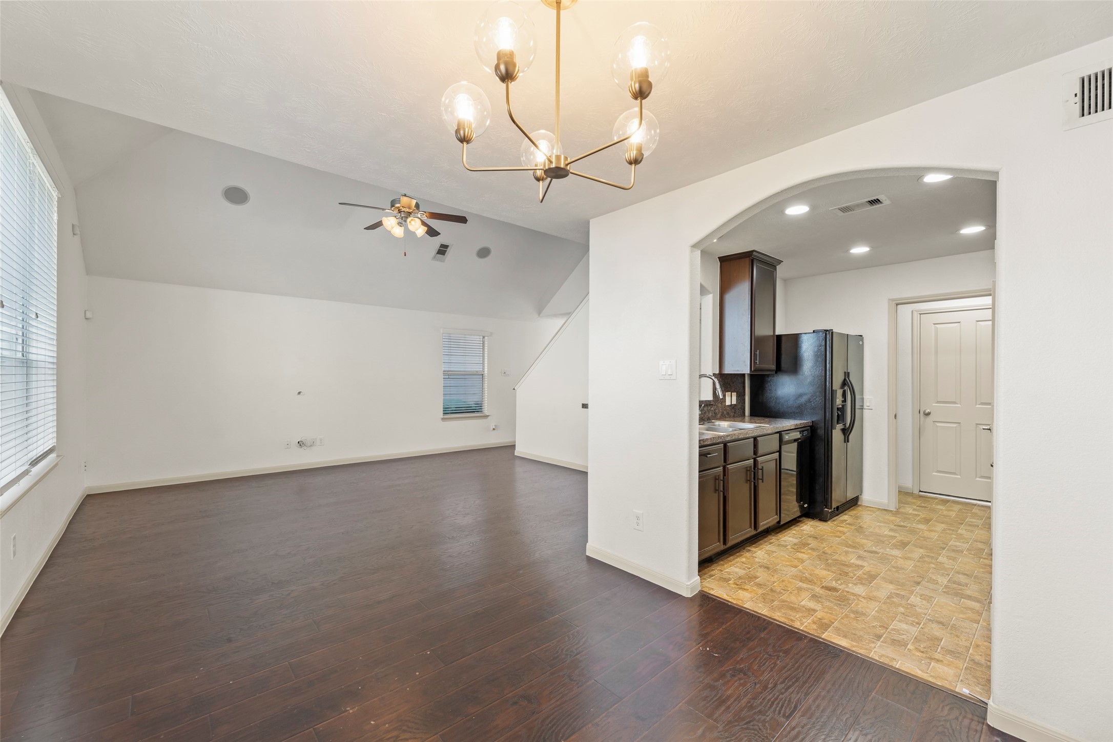3406 Inverness Path Lane Houston, TX 77053 - Photo 12 of 34 a view of a kitchen with a sink and a refrigerator