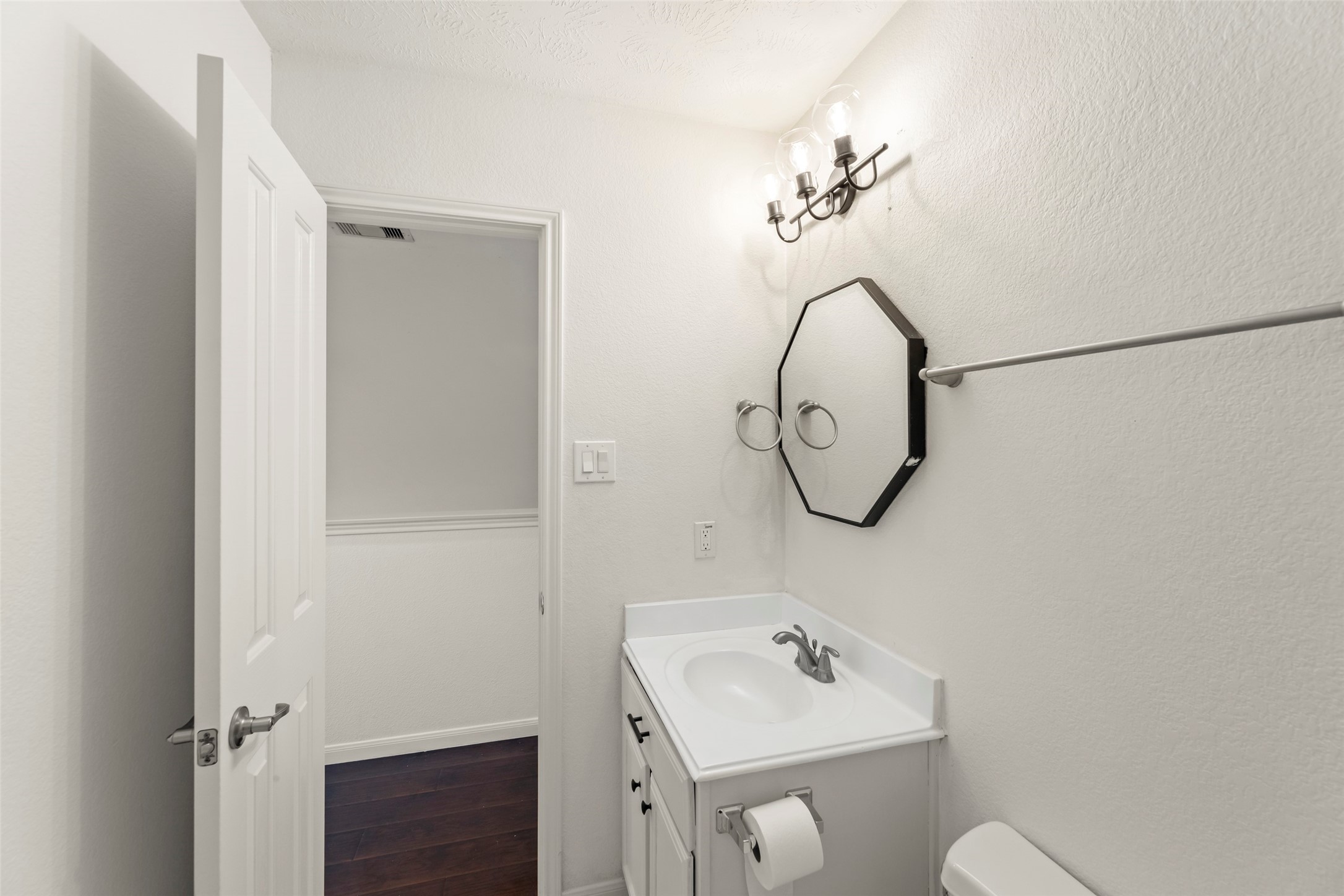 3406 Inverness Path Lane Houston, TX 77053 - Photo 18 of 34 a bathroom with a sink and a mirror