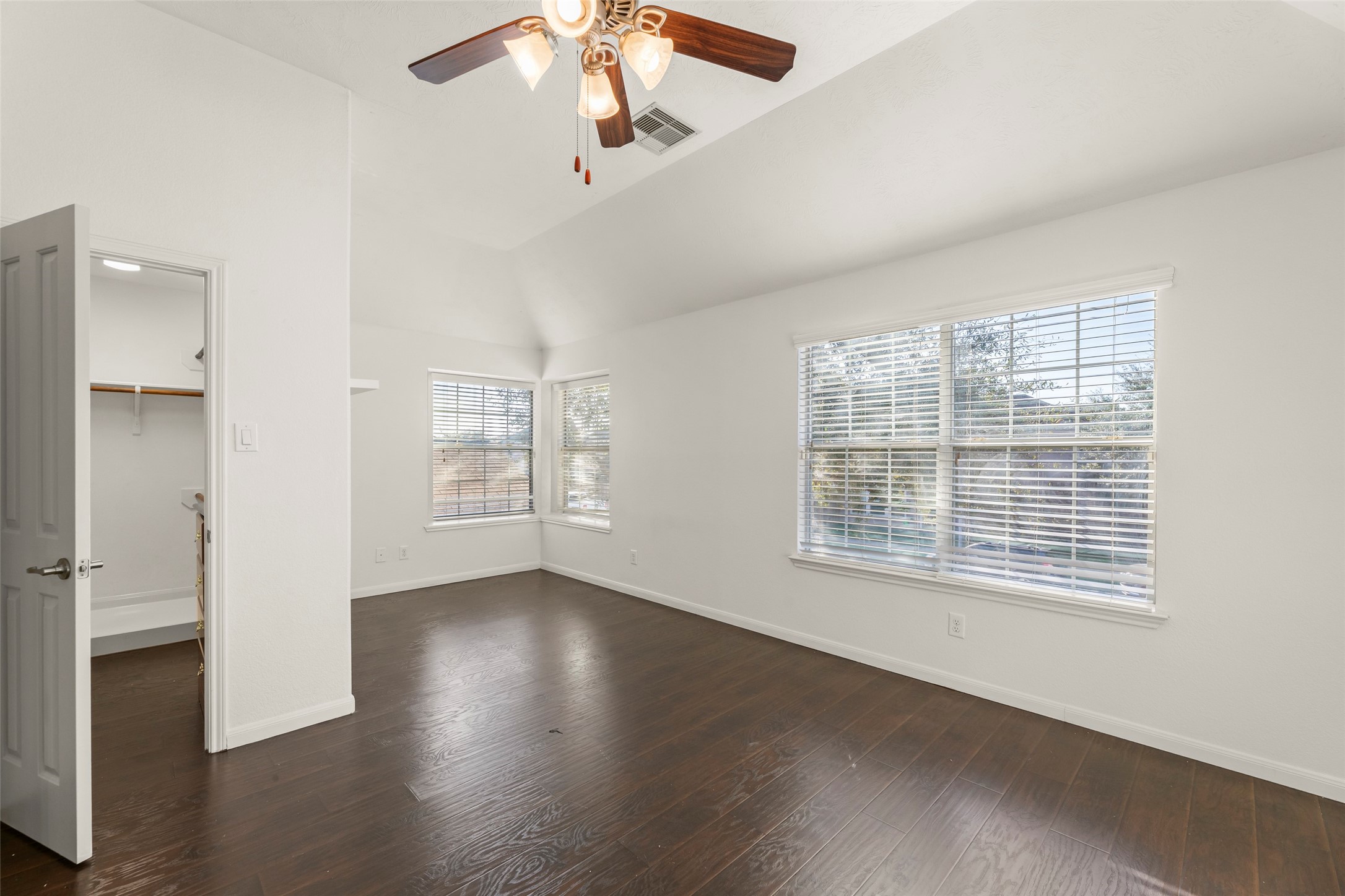3406 Inverness Path Lane Houston, TX 77053 - Photo 23 of 34 wooden floor in an empty room with a window