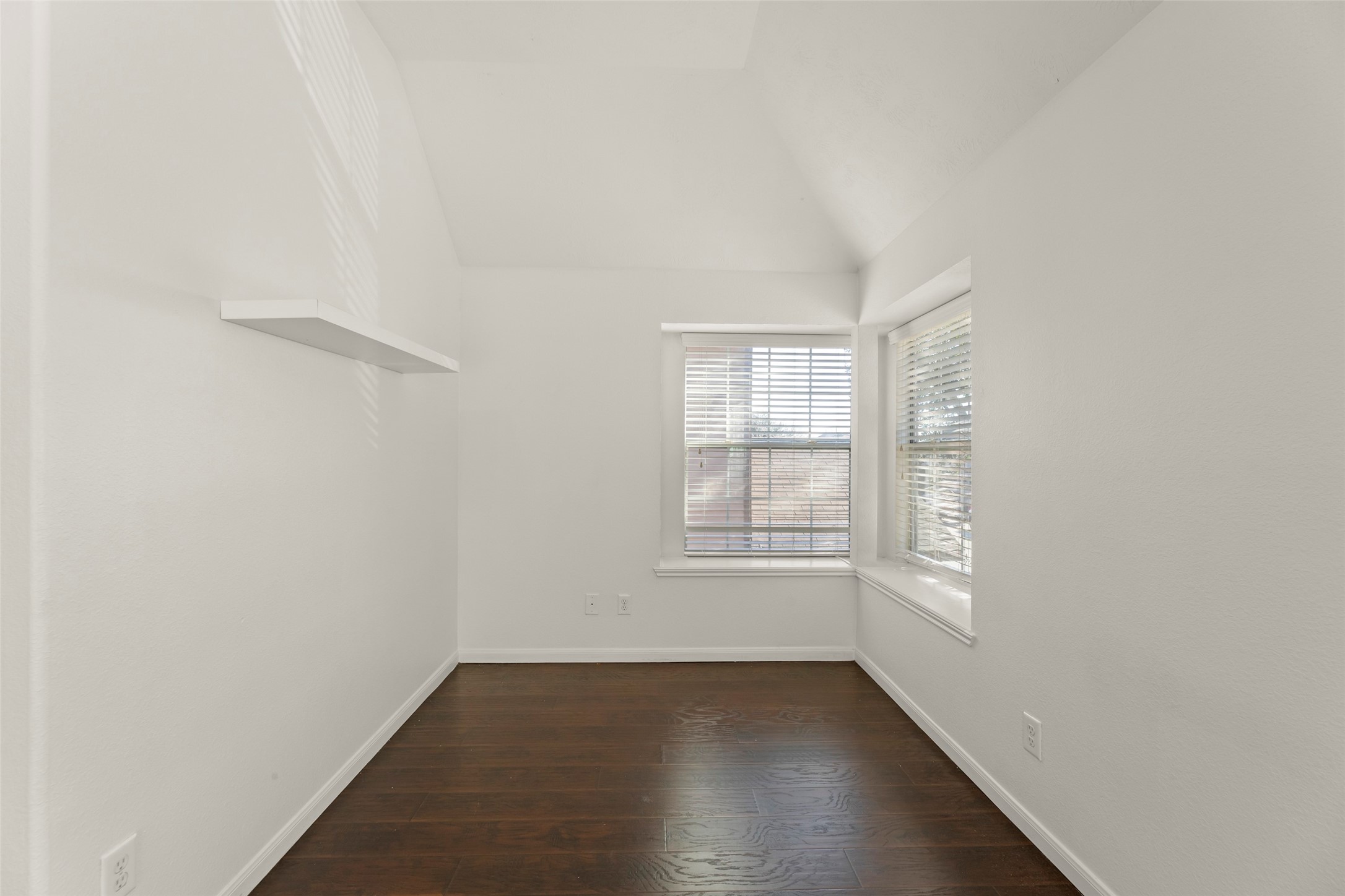 3406 Inverness Path Lane Houston, TX 77053 - Photo 24 of 34 an empty room with wooden floor and windows