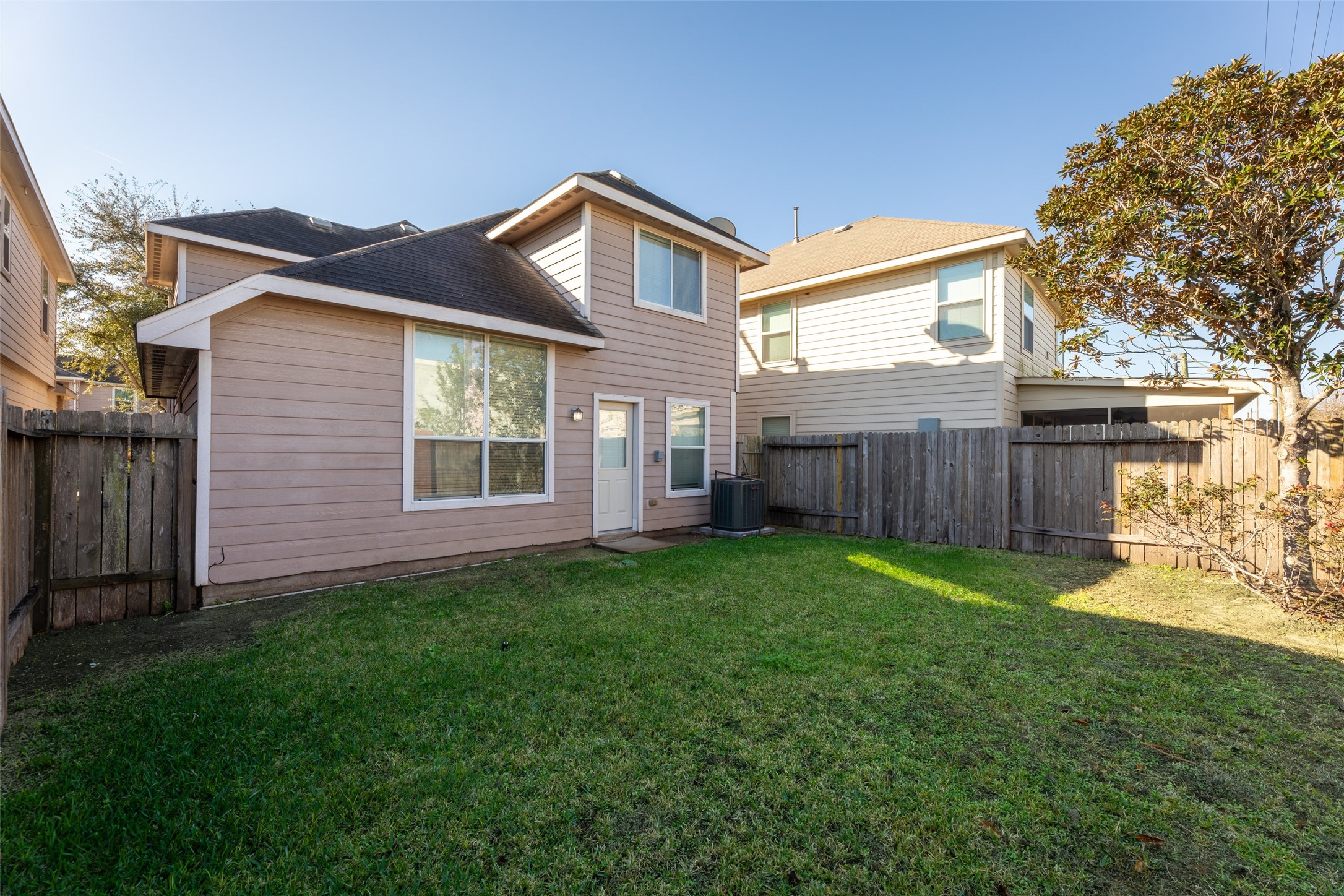 3406 Inverness Path Lane Houston, TX 77053 - Photo 32 of 34 a view of a house with a yard