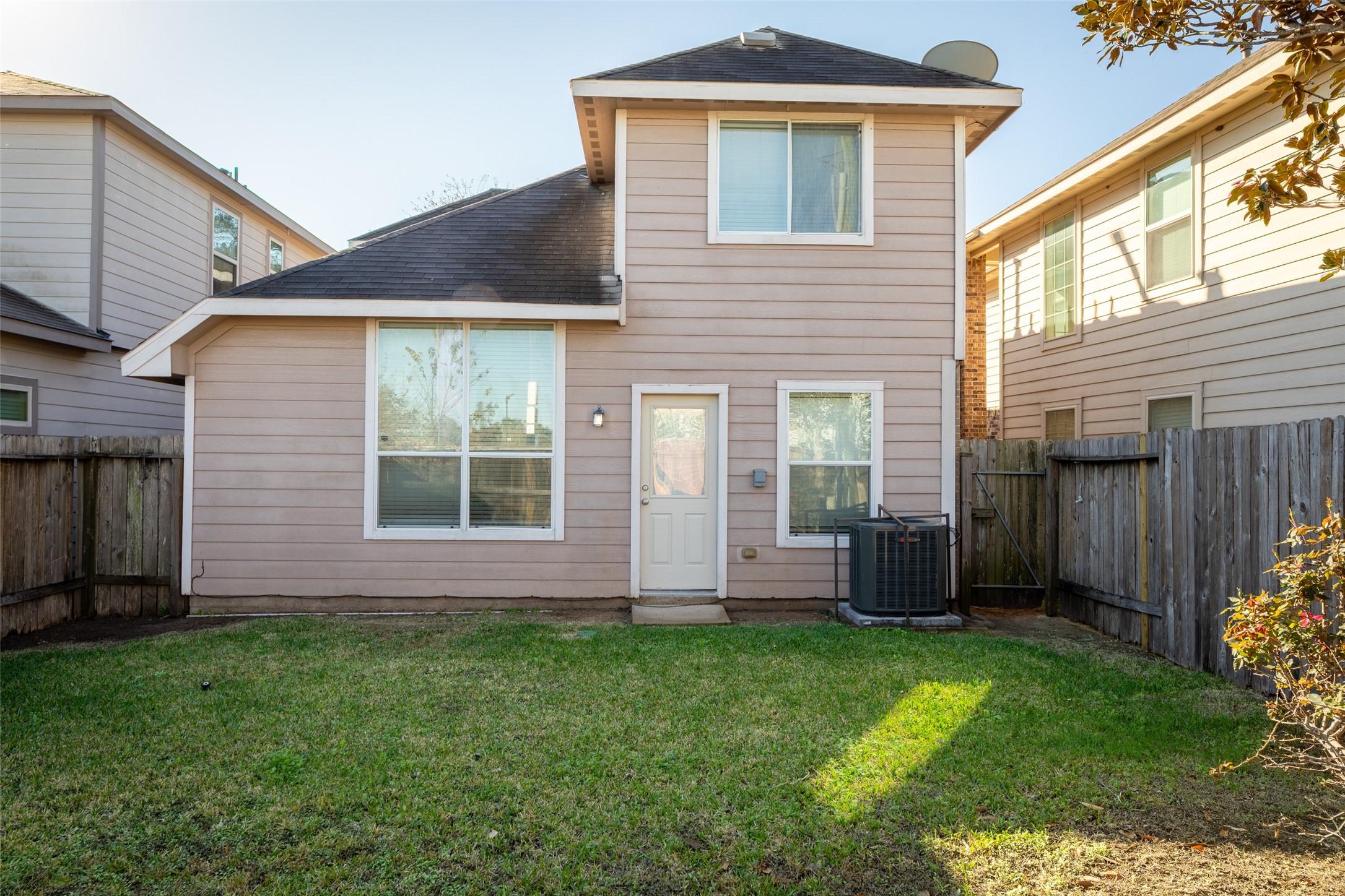 3406 Inverness Path Lane Houston, TX 77053 - Photo 33 of 34 a front view of house with yard and outdoor seating